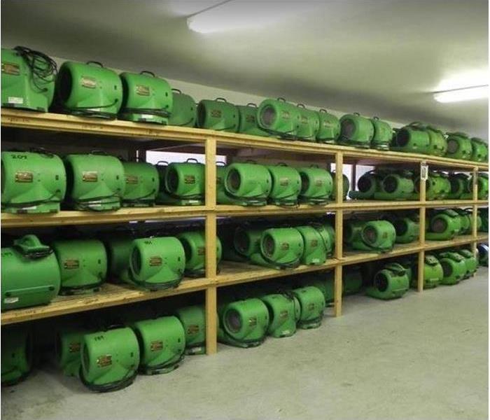 SERVPRO drying equipment stacked inside storage facility